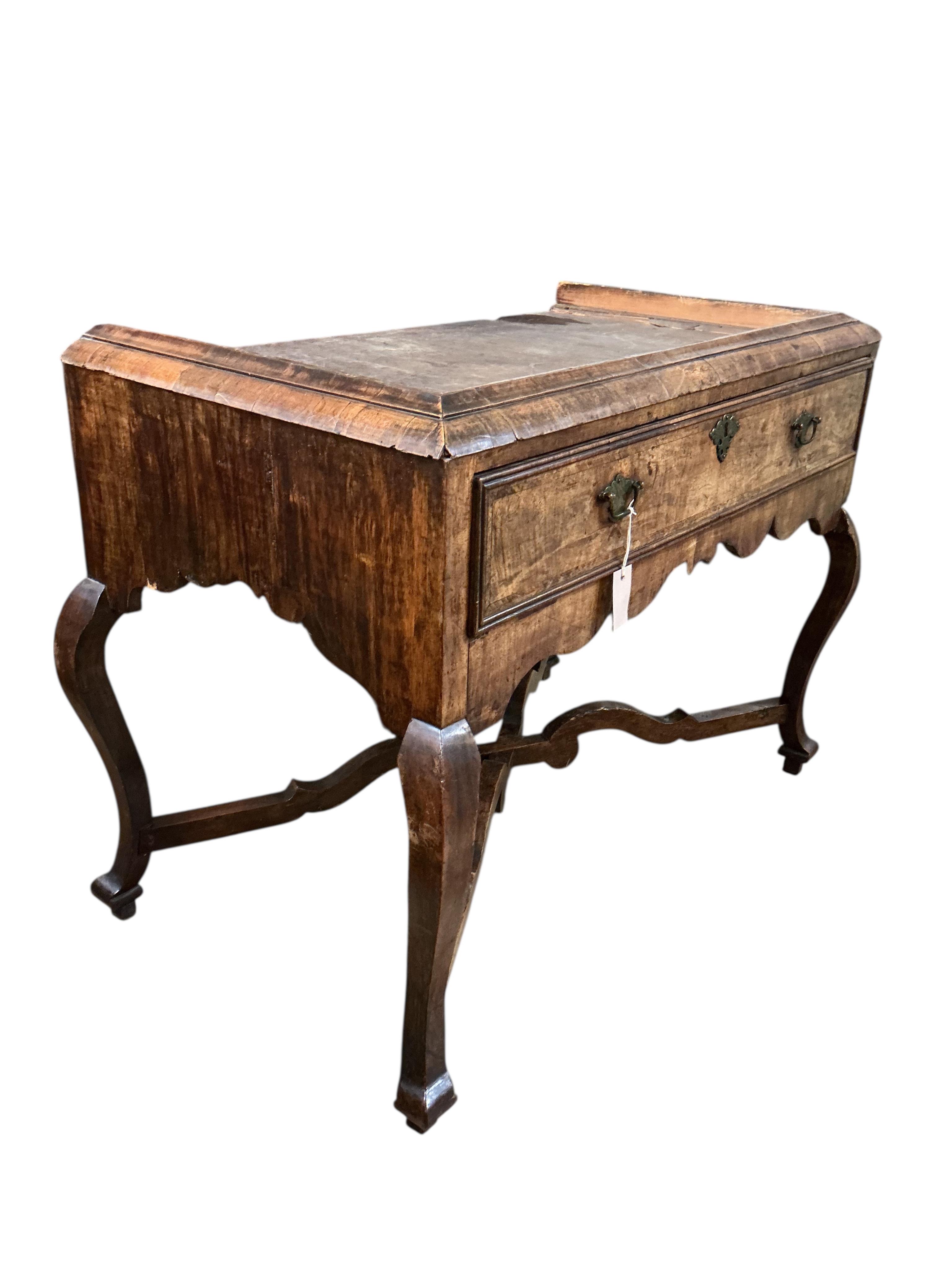 An 18th century walnut stand, width 102cm, depth 56cm, height 81cm